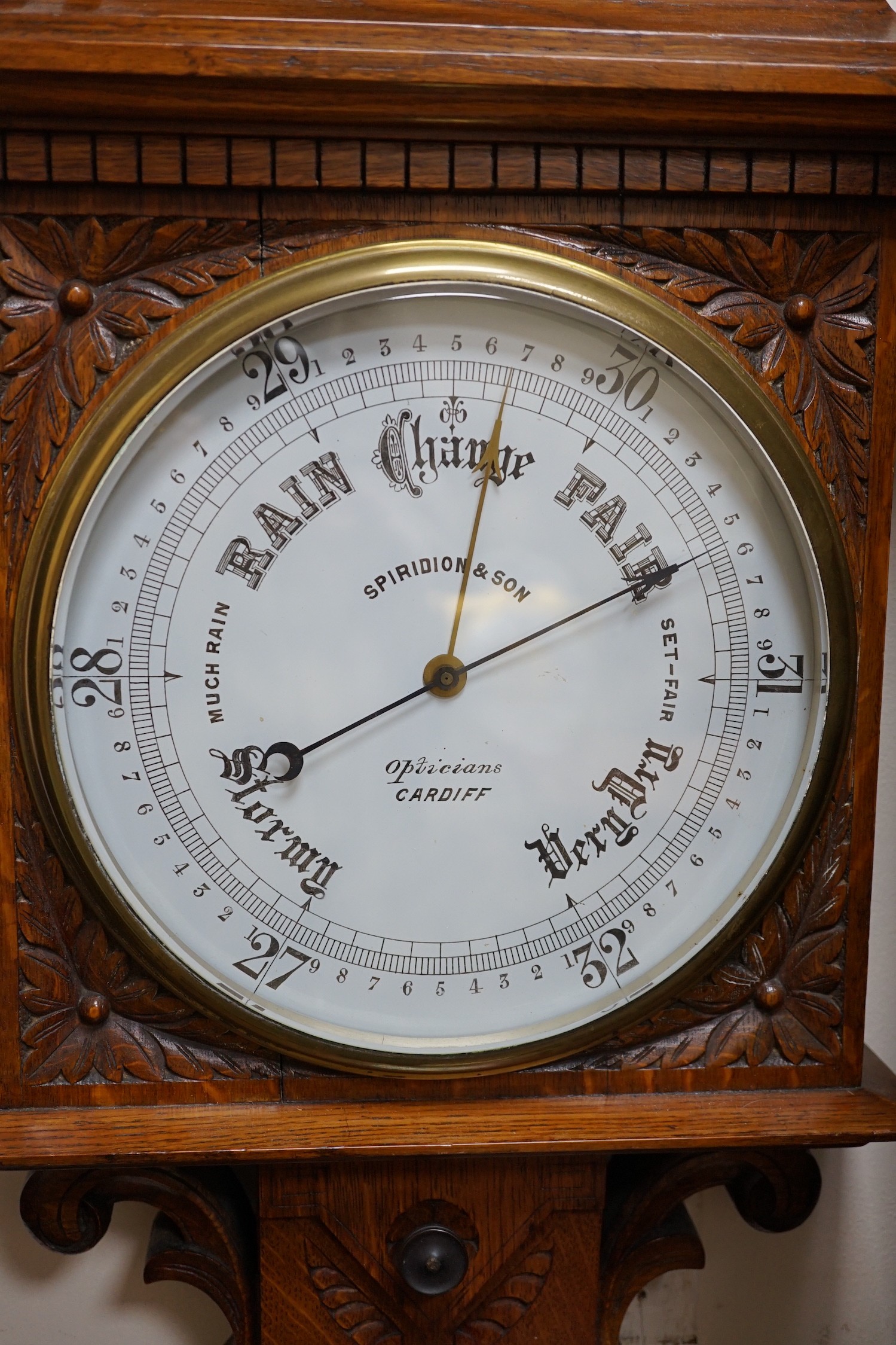 A Victorian Spiridon & Son oak cased barometer / thermometer. Approx 100cm tall